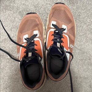 On Running Women’s Athletic Shoes in Brown and Orange